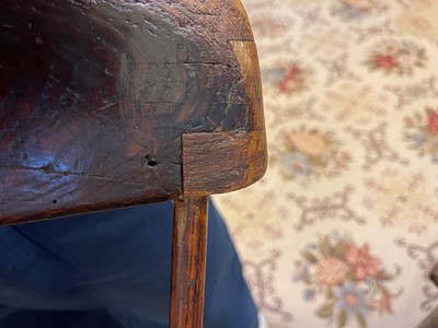 Lot 356 - A large ash and elm comb-back Windsor armchair