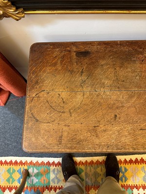 Lot 404 - An oak writing table by Holland & Sons