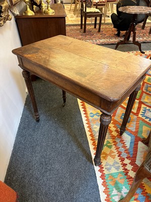 Lot 404 - An oak writing table by Holland & Sons