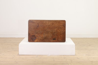 Lot 404 - An oak writing table by Holland & Sons