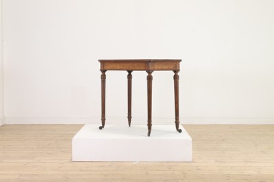 Lot 404 - An oak writing table by Holland & Sons