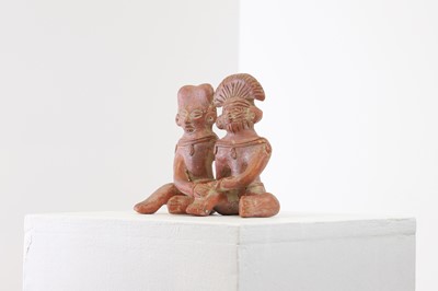 Lot 82 - A clay figure group