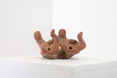 Lot 82 - A clay figure group