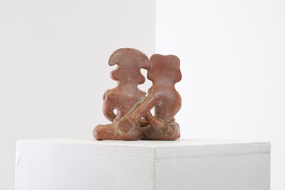 Lot 82 - A clay figure group