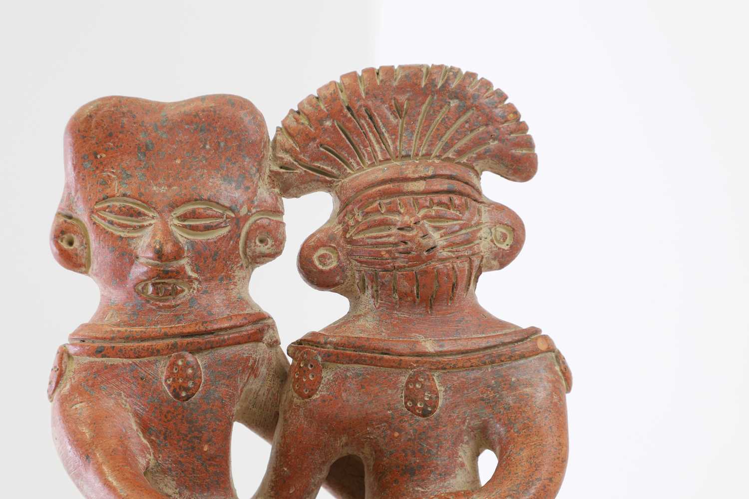 Lot 82 - A clay figure group