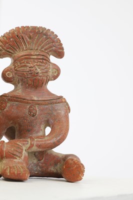 Lot 82 - A clay figure group