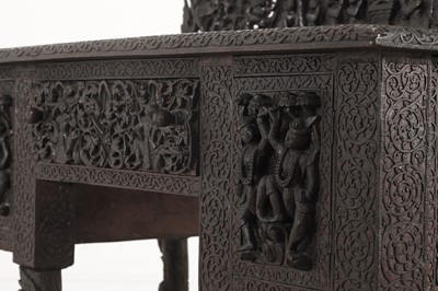 Lot 234 - A carved teak serving table
