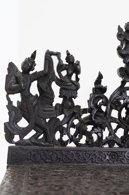 Lot 234 - A carved teak serving table