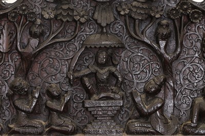 Lot 234 - A carved teak serving table