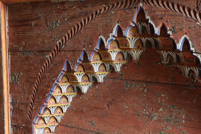 Lot 243 - A massive carved and painted overdoor or arch