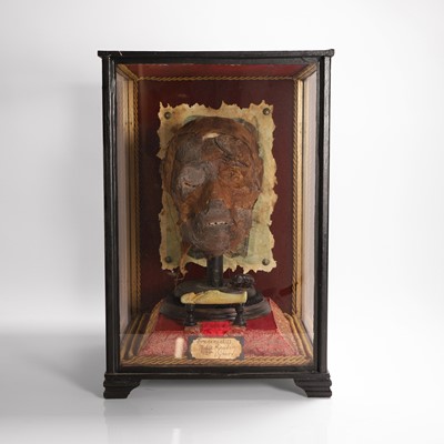 Lot 58 - A replica Egyptian mummy's head