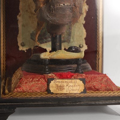 Lot 58 - A replica Egyptian mummy's head