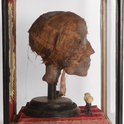 Lot 58 - A replica Egyptian mummy's head