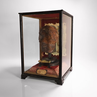 Lot 58 - A replica Egyptian mummy's head
