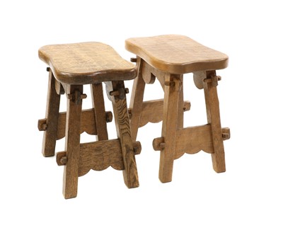 Lot 397 - A pair of adzed oak occasional tables