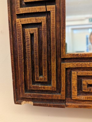 Lot 170 - A carved wooden mirror