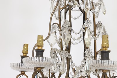 Lot 338 - A gilt-brass and glass ceiling light in the style of Maison Baguès