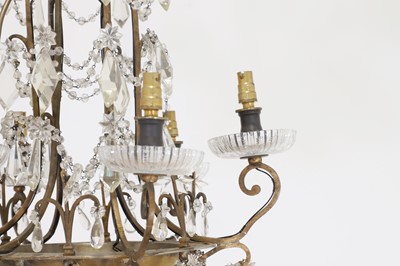 Lot 338 - A gilt-brass and glass ceiling light in the style of Maison Baguès