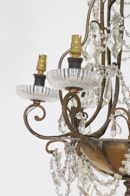 Lot 338 - A gilt-brass and glass ceiling light in the style of Maison Baguès