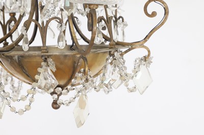 Lot 338 - A gilt-brass and glass ceiling light in the style of Maison Baguès