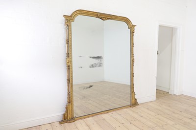 Lot 211 - A large giltwood overmantel mirror