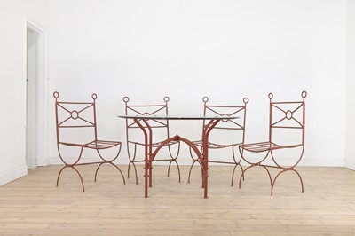 Lot 517 - A painted wrought-iron table and chairs