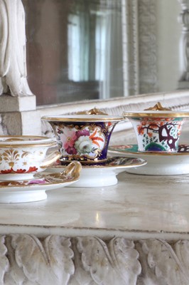 Lot 384 - ☘ A pair of Crown Derby coffee cups and saucers