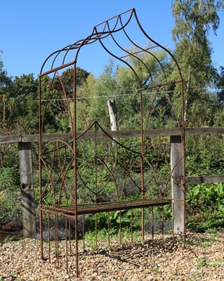 Lot 471 - A wrought iron garden arbour seat