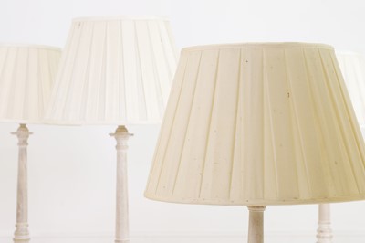Lot 493 - A set of six limed wooden table lamps by OKA