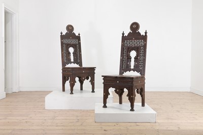 Lot 224 - A pair of walnut and mother-of-pearl inlaid side chairs