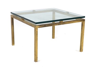 Lot 551 - A brass and glass side table