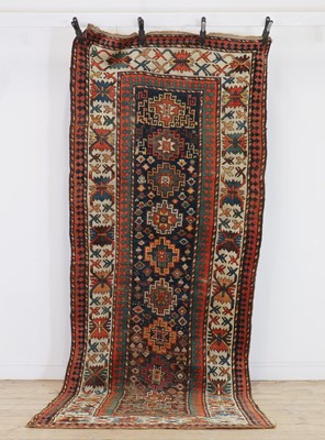 Lot 378 - A tribal wool runner