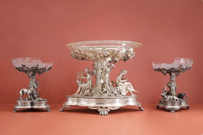 Lot 77 - A Victorian three-piece silver-plated table garniture