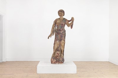 Lot 511 - A carved and painted pine advertising figure