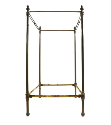 Lot 447 - A Victorian brass four poster bed