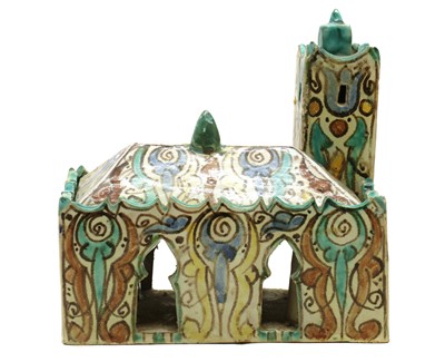 Lot 166 - A glazed earthenware pen holder