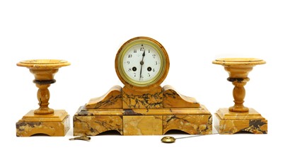 Lot 239 - A Giallo Siena marble clock garniture