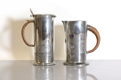 Lot 74 - A Tudric pewter lidded jug