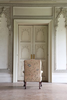 Lot 108 - A George III-style mahogany-framed wingback armchair