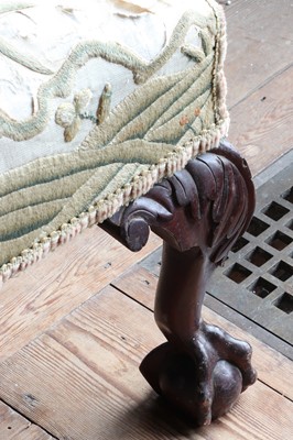 Lot 108 - A George III-style mahogany-framed wingback armchair