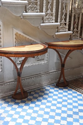 Lot 88 - A pair of Continental satinwood and painted consoles
