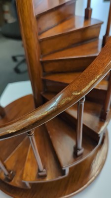Lot 123 - A turned wooden model of a staircase