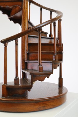 Lot 123 - A turned wooden model of a staircase