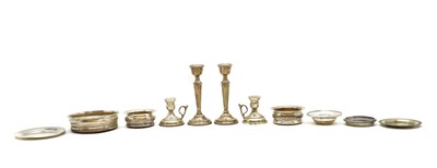 Lot 89 - A pair of silver candlesticks