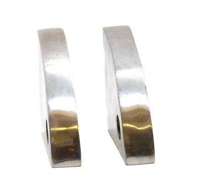 Lot 274 - A pair of modernist cast aluminium bookends