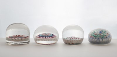Lot 204 - A group of four Old English glass paperweights