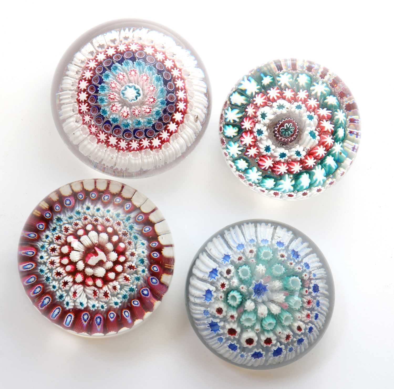 Lot 204 - A group of four Old English glass paperweights