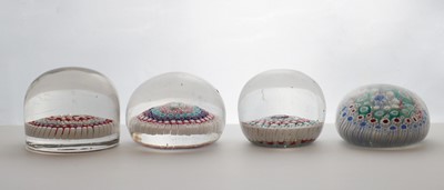 Lot 204 - A group of four Old English glass paperweights