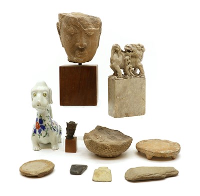 Lot 141 - A stone carving of a Buddha head
