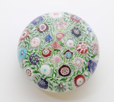 Lot 202 - A Clichy glass spaced millefiori paperweight